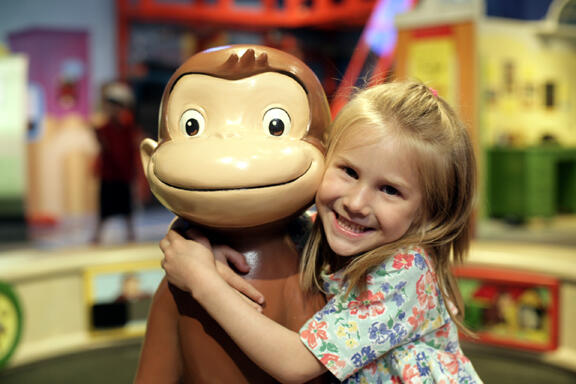 Curious George: Let's Get Curious!  2,500 sq ft